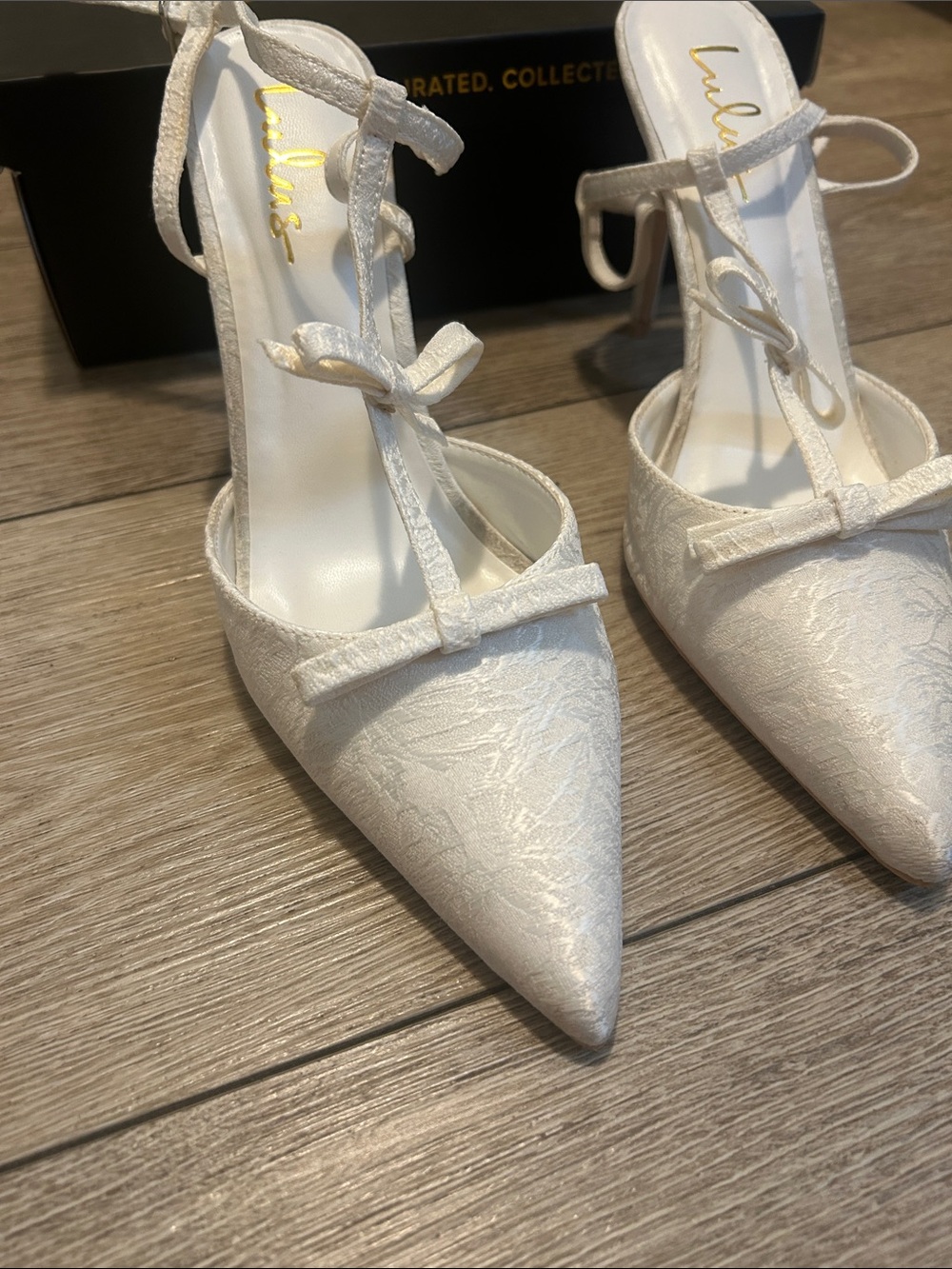 Lulu's White Pointed T-Strap Bow Heels